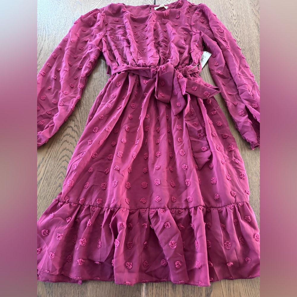 Dress size M.  Burgundy  color